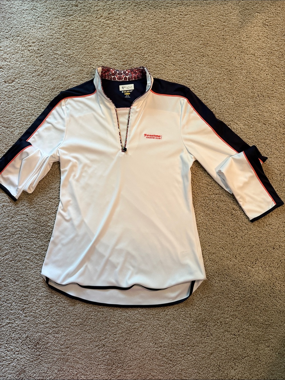 Greg Norman Collection White Polo with Navy and Red Trim